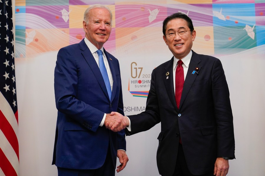 President Joe Biden, left, shakes hands with Japan's Prime Minister Fumio Kishida ahead of a bilateral meeting in Hiroshima, Japan, Thursday, May 18, 2023, ahead of the start of the G-7 Summit. (AP Photo/Susan Walsh)