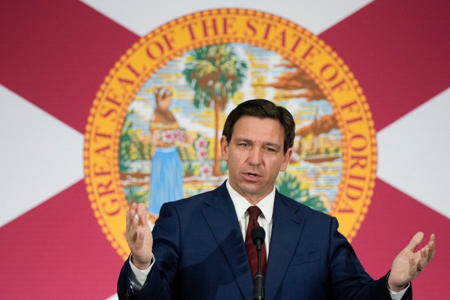 FILE - Florida Gov. Ron DeSantis speaks during a news conference to sign several bills related to public education and increases in teacher pay, in Miami, on May 9, 2023. (AP Photo/Rebecca Blackwell, File)