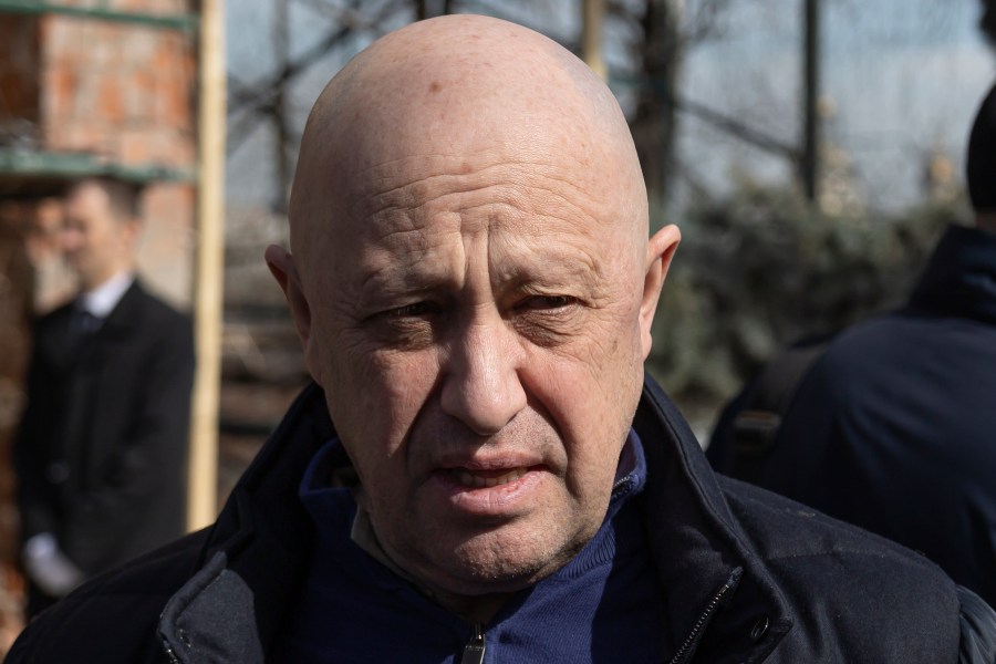 FILE - Yevgeny Prigozhin, the owner of the Wagner Group military company, arrives during a funeral ceremony at the Troyekurovskoye cemetery in Moscow, Russia, Saturday, April 8, 2023. Prigozhin is threatening to pull his troops out of the protracted battle for the eastern Ukraine city of Bakhmut next week. He accused Russia’s military command Friday, May 5 of starving his forces of ammunition and rendering them unable to fight. (AP Photo, file)