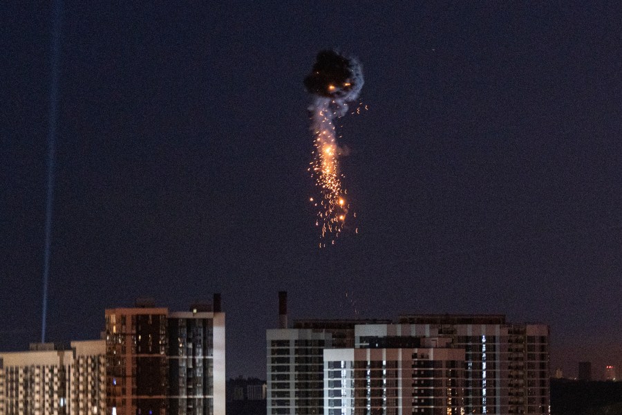 Ukrainian air defense intercepts a Shahed drone mid-air in the third Russia aerial attack on the capital in the last 24 hours in Kyiv, Ukraine, Tuesday, May 30, 2023. (AP Photo/Evgeniy Maloletka)