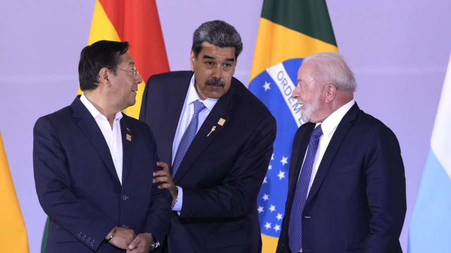 Bolivia's President Luis Arce, from left, Venezuela's President Nicolas Maduro and Brazilian President Luiz Inacio Lula da Silva assemble for a group photo during the South American Summit at Itamaraty palace in Brasilia, Brazil, Tuesday, May 30, 2023.