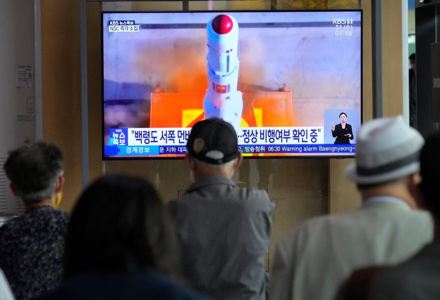 A TV screen shows a file image of North Korea's rocket launch during a news program at the Seoul Railway Station in Seoul, South Korea, Wednesday, May 31, 2023. North Korea launched a purported rocket Wednesday, a day after the country announced a plan to put its first military spy satellite into orbit, South Korea's military said. (AP Photo/Ahn Young-joon)