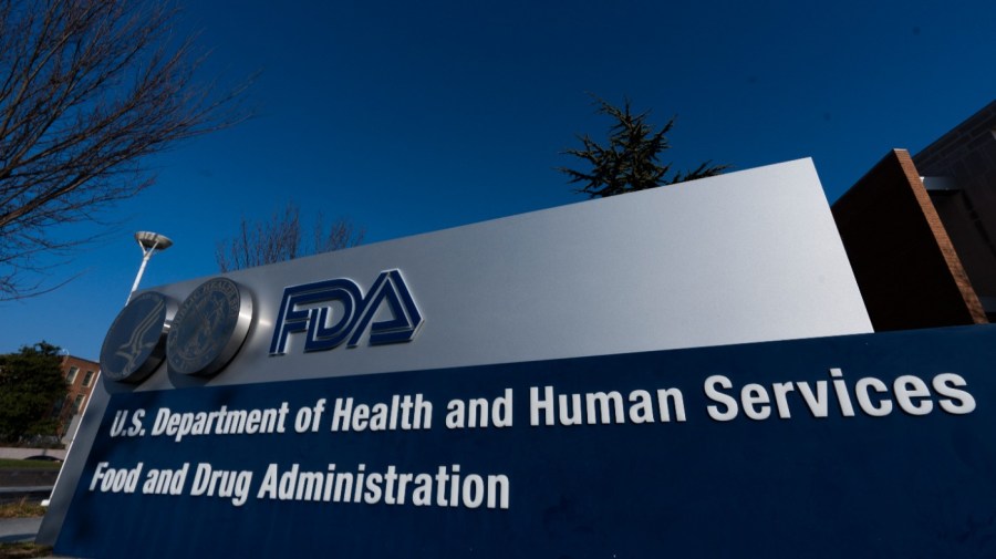 FILE - A sign in front of the Food and Drug Administration building is seen on Dec. 10, 2020, in Silver Spring, Md. Expedited drug approvals slowed in 2022, as the FDA's controversial accelerated pathway came under new scrutiny from Congress, government watchdogs and some of the agency’s own leaders. With less than a month remaining in the year, the agency’s drug center has granted 10 accelerated approvals — fewer than the tally in each of the last five years, when use of the program reached all-time highs. (AP Photo/Manuel Balce Ceneta, File)