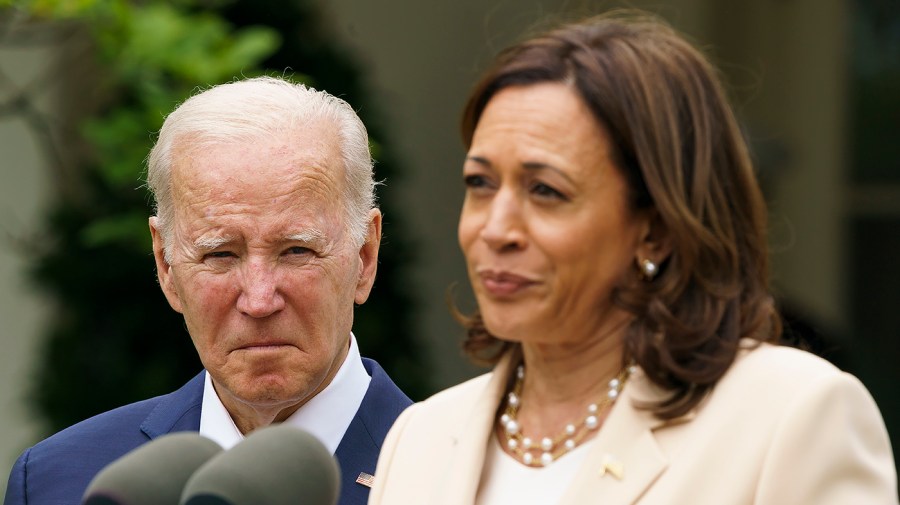 President Biden is seen as Vice President Harris speaks during an event to highlight National Small Business Week