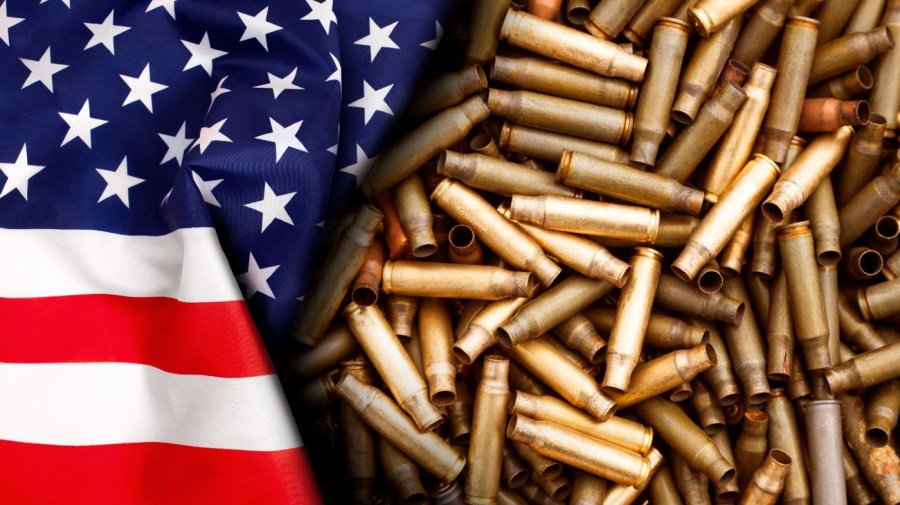 American flag isolated on shotgun cartridges background