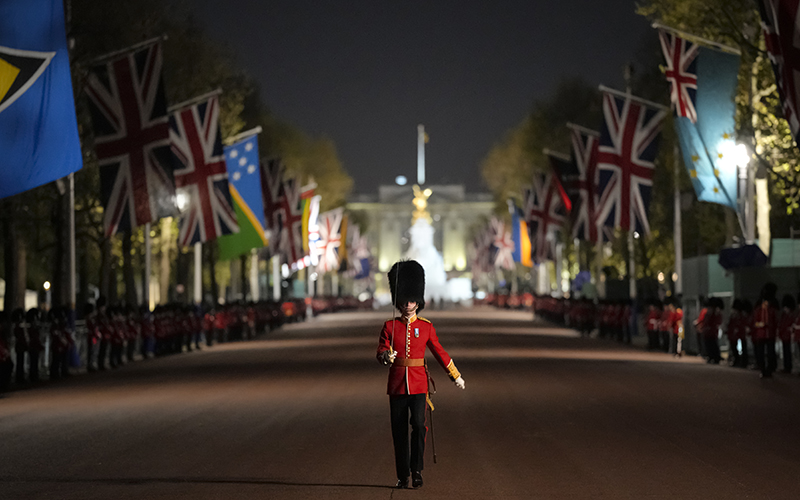 A member of the military marches on The Mall, in central London