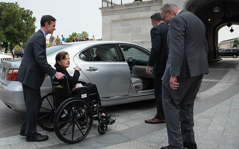 Sen. Dianne Feinstein (D-Calif.) is greeted by Majority Leader Chuck Schumer (D-N.Y.) as she arrives at the Capitol