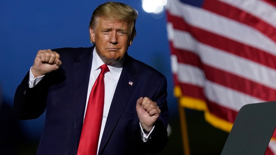 In this Sept. 25, 2020 photo, President Donald Trump does a little dance as he leaves the stage during an campaign rally in Newport News, Va.