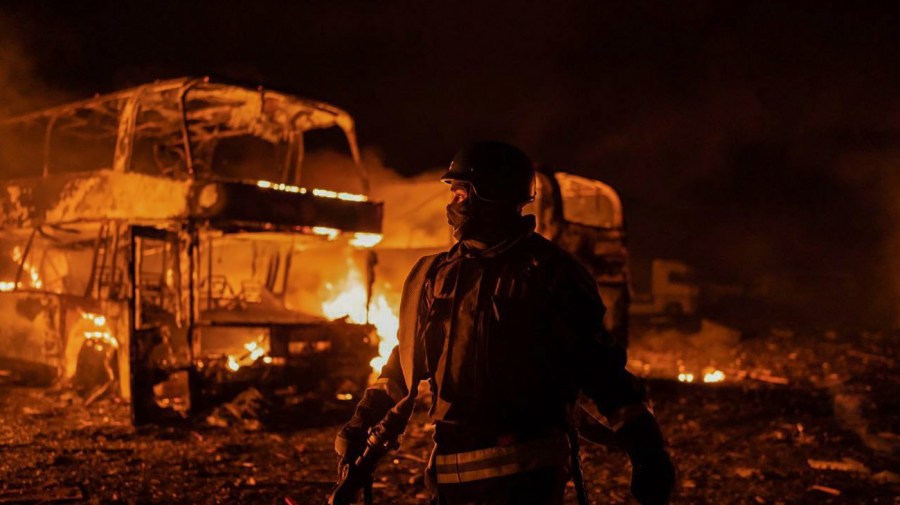 In this photo provided by the Ukrainian Emergency Situations Ministry, firefighters put out fire caused by fragments of a Russian rocket after it was shot down by air defense system during the night Russian rocket attack in Kyiv, Ukraine, early Tuesday, May 16, 2023.