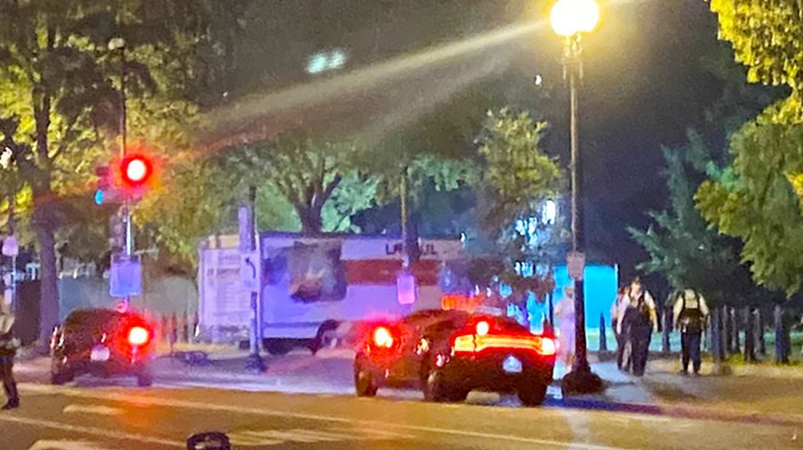 A box truck is seen crashed into a security barrier at a park across from the White House, Monday night, May 23, 2023 in Washington. Police have arrested a man they believe intentionally crashed a U-Haul truck into a security barrier near the north side of Lafayette Square late Monday night. No one was injured.