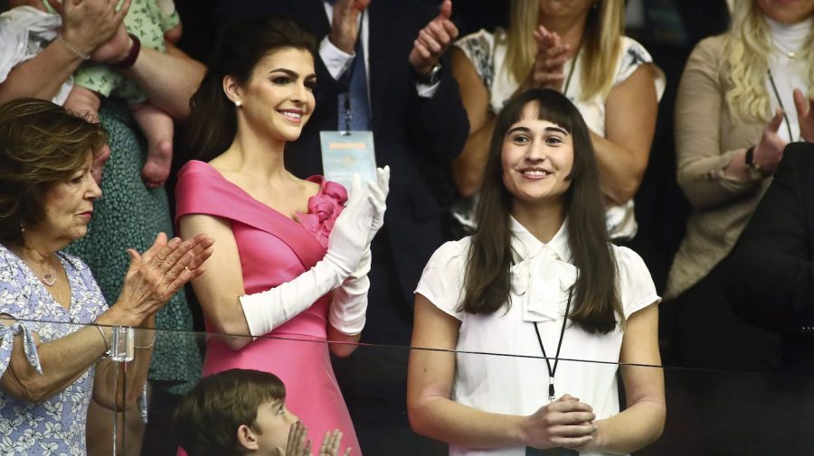 Chloe Cole, center, is recognized by Florida Gov. Ron DeSantis during a joint session for his State of the State speech Tuesday, Mar. 7, 2023 at the Capitol in Tallahassee, Fla. At left, is Florida first lady Casey DeSantis. (AP Photo/Phil Sears, File)