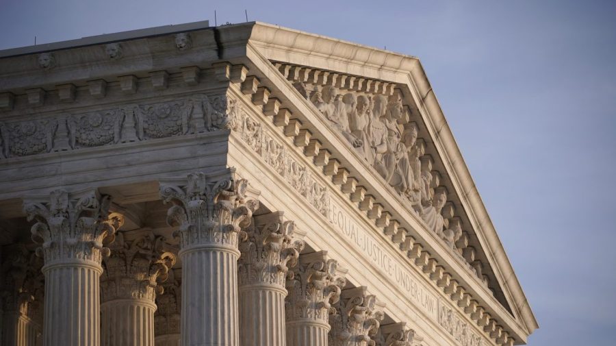 FILE - The Supreme Court is seen in Washington, on Nov. 5, 2020. The Supreme Court has unanimously revived whistleblower lawsuits claiming that supermarket and pharmacy chains SuperValu and Safeway overcharged government health-care programs for prescription drugs by hundreds of millions of dollars. (AP Photo/J. Scott Applewhite, File)