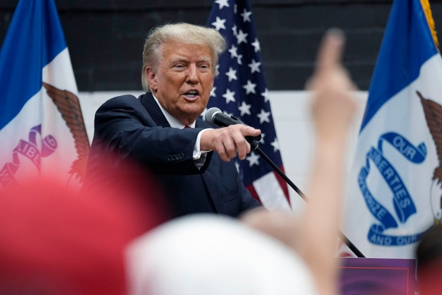 Former President Donald Trump visits with campaign volunteers at the Grimes Community Complex Park, Thursday, June 1, 2023, in Des Moines, Iowa. (AP Photo/Charlie Neibergall)