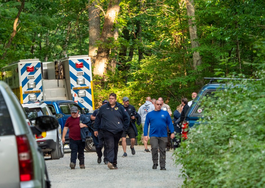 Search and rescue teams leave the command post at St. Mary's Wilderness en route to the Blue Ridge Parkway to search for the site where a Cessna Citation crashed over mountainous terrain near Montebello, Va., Sunday, June 4, 2023. (Randall K. Wolf via AP)