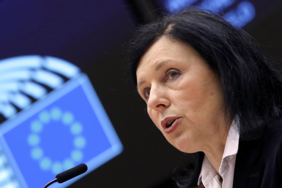 FILE - European Commissioner for Values and Transparency Vera Jourova addresses the plenary at the European Parliament in Brussels, Thursday, March 25, 2021. The European Union is pushing online platforms like Google and Meta to step up the fight against false information by adding labels to text, photos and other content generated by artificial intelligence, EU Commission Vice President Vera Jourova said Monday. (Yves Herman, Pool via AP, File)