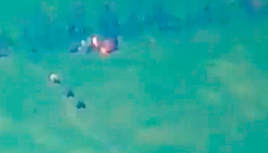 This photo taken from video released by Russian Defense Ministry Press Service on Monday, June 5, 2023, show a Ukrainian military vehicle being hit during a combat in Ukraine. The Russian Defense Ministry said the Russian military fended off an attempt by Ukraine to launch an attack in the southern part of the Donetsk region on Sunday. (Russian Defense Ministry Press Service via AP)