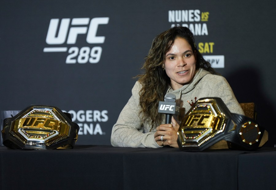 Amanda Nunes responds to questions during a news conference ahead of her fight against Irene Aldana at UFC 289, in Vancouver, British Columbia, Wednesday, June 7, 2023. (Darryl Dyck/The Canadian Press via AP)