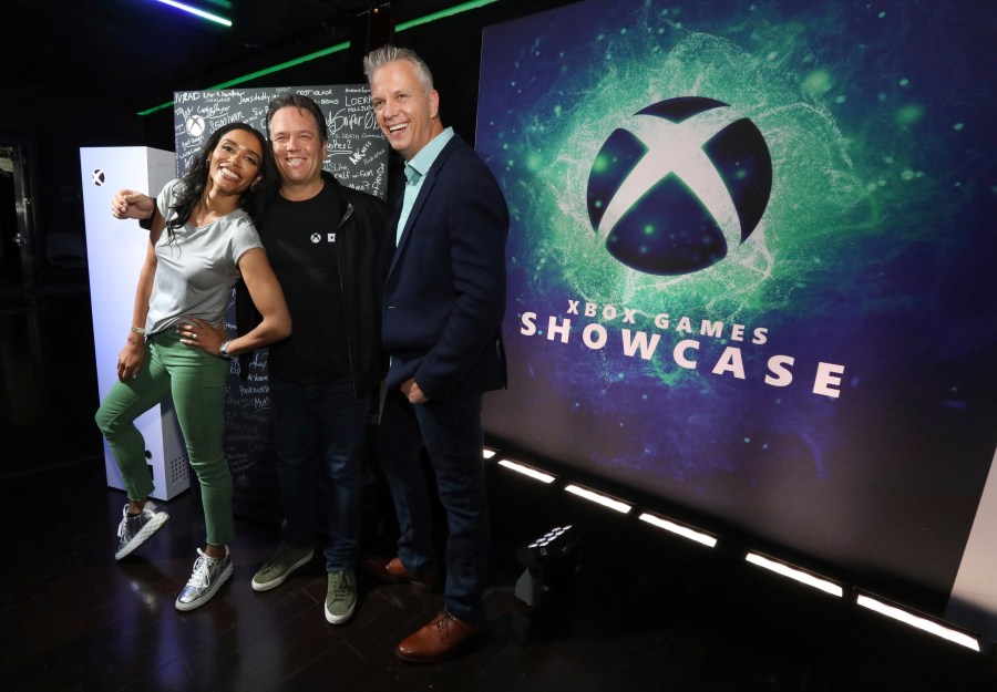 IMAGE DISTRIBUTED FOR XBOX - Sarah Bond, from left, CVP Game Creator Ecosystem, Phil Spencer, Head of Xbox, and Matt Booty, CVP Xbox Game Studios, pose during the 2023 Xbox FanFest on Sunday, June 11, 2023 in Los Angeles. (Casey Rodgers/AP Images for Xbox)