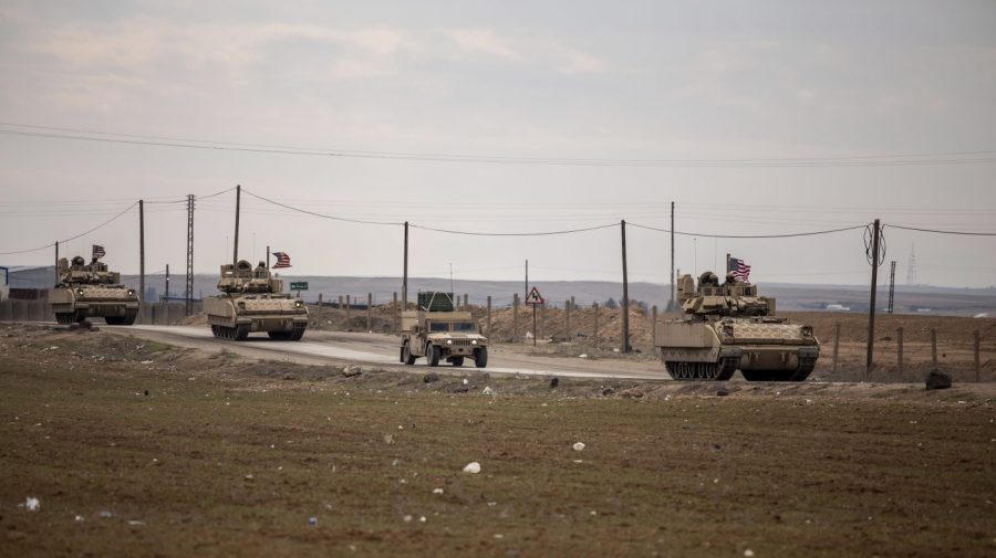 FILE - American military convoy patrol in Hassakeh, Syria, on Feb. 8, 2022. A helicopter accident in northeastern Syria over the weekend left 22 American service members injured, the U.S. military said Tuesday, June 13, 2023, adding that the cause of the accident was under investigation and that no enemy fire involved. (AP Photo/Baderkhan Ahmad, File)