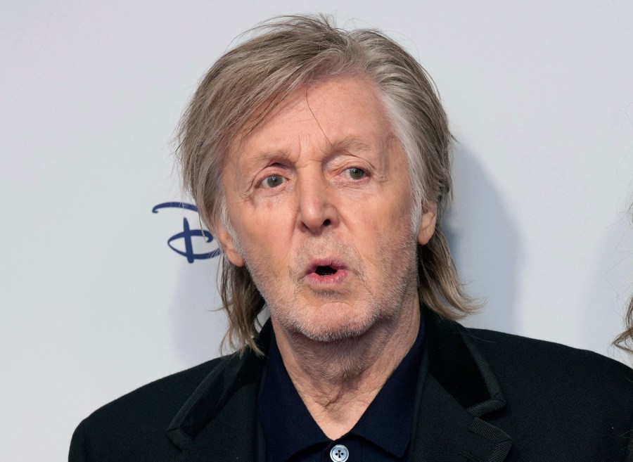 FILE - Paul McCartney and Nancy Shevell pose for photographers upon arrival for the premiere of the film 'If These Walls Could Sing' in London, Monday, Dec. 12, 2022. Artificial intelligence has been used to extract John Lennon's voice from an old demo to create “the last Beatles record,” Paul McCartney said Tuesday, June 13, 2023. McCartney, 80, told the BBC that the technology was used to separate the Beatles' voices from background sounds during the making of director Peter Jackson's 2021 documentary series, “The Beatles: Get Back." (Photo by Scott Garfitt/Invision/AP, File)