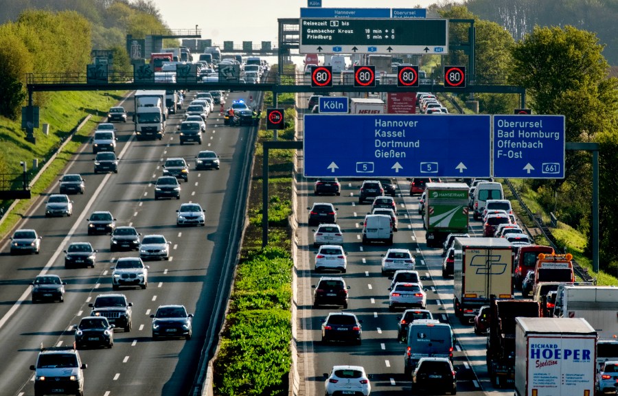 FILE - Cars and trucks queue on a highway in Frankfurt, Germany, Wednesday, April 26, 2023. German officials said Wednesday, June 14, 2023, that an array of climate measures being introduced by the government will bring the country closer but not all the way toward meeting its national goals for cutting greenhouse gas emissions by 2030. (AP Photo/Michael Probst, File)