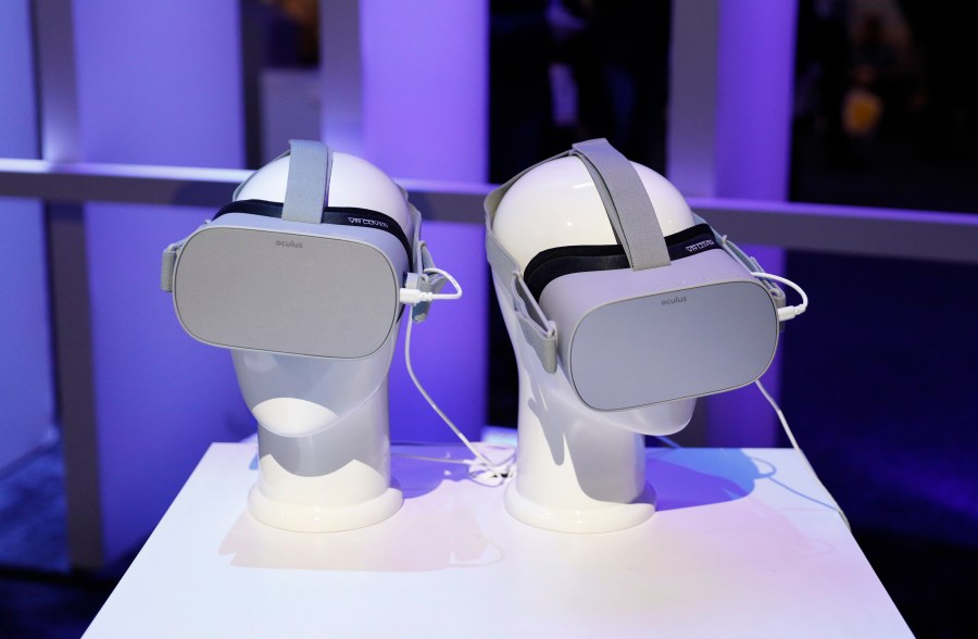 FILE - Oculus VR headsets sit on display at CES International on Jan. 8, 2019, in Las Vegas. The corporate parent of Facebook and Instagram plans to open a digital gateway for kids as young as 10 years old to enter virtual reality through the Meta Quest headset, according to a blog post Friday, June 16, 2023, despite rising concerns about children spending too much time on social media. (AP Photo/John Locher, File)