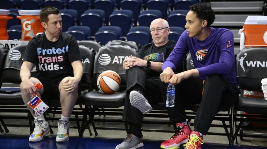 Phoenix Mercury center Brittney Griner, right, talks with Washington Mystics coach Eric Thibault, left, and general manager Mike Thibault before a WNBA basketball game Friday, June 16, 2023, in Washington. (AP Photo/Nick Wass)