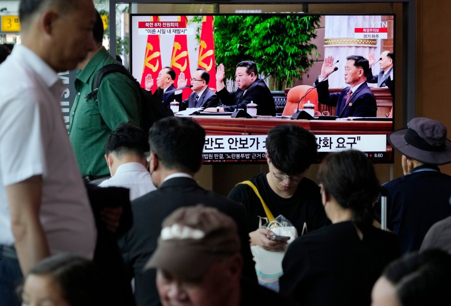 A TV screen shows an image of North Korean leader Kim Jong Un, center on the screen, during a news program, at the Seoul Railway Station in Seoul, South Korea, Monday, June 19, 2023. Top North Korean officials vowed to push for a second attempt to launch a spy satellite as they called their country's first, and failed, launch last month "the most serious" shortcoming this year and harshly criticized those responsible, state media reported Monday. (AP Photo/Ahn Young-joon)