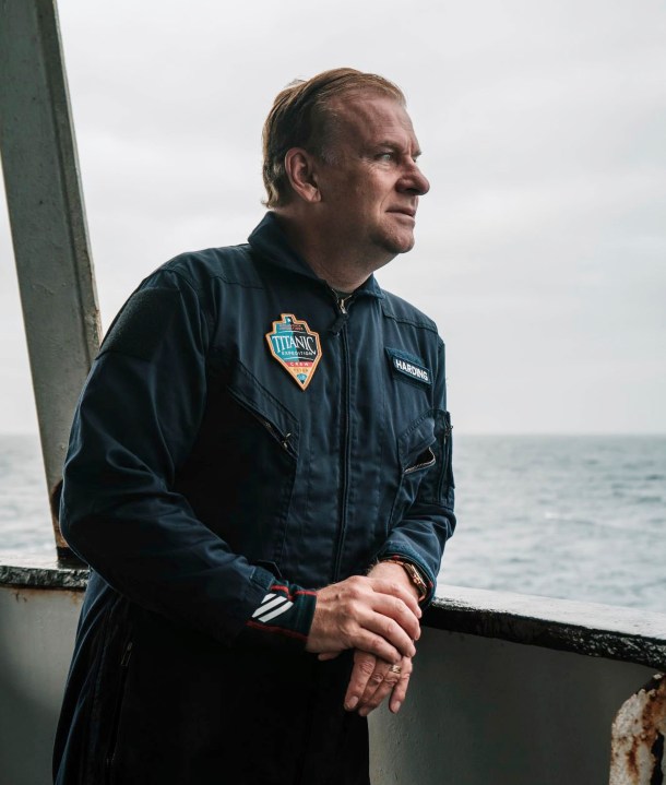 In this photograph released by Action Aviation, company chairman and billionaire adventurer Hamish Harding looks out to sea before boarding the submersible Titan for a dive into the Atlantic Ocean on an expedition to the Titanic on Sunday, June 18, 2023. Rescuers raced against time Tuesday, June 20, to find the missing submersible carrying Harding and four other people, who were reported overdue Sunday night. (Action Aviation via AP)