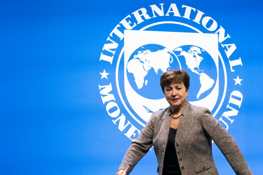 FILE - International Monetary Fund Managing Director Kristalina Georgieva walks to the podium during the 2022 annual meeting of the International Monetary Fund and the World Bank Group on Oct. 14, 2022, in Washington. Heads of state, finance leaders and activists from around the world will converge in Paris this week to seek ways to overhaul the world's development banks — like the International Monetary Fund and World Bank — and help them weather a warmer and stormier world.(AP Photo/Manuel Balce Ceneta, File)