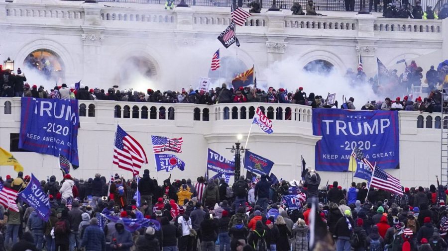 FILE - Rioters at the U.S. Capitol on Jan. 6, 2021, in Washington. (AP Photo/John Minchillo, File)