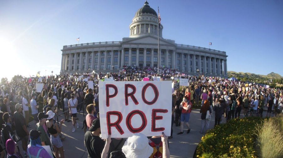 FILE - People attend an abortion-rights rally at the Utah State Capitol in Salt Lake City after the U.S. Supreme Court overturned Roe v. Wade, June 24, 2022. One year ago, the U.S. Supreme Court rescinded a five-decade-old right to abortion, prompting a seismic shift in debates about politics, values, freedom and fairness. (AP Photo/Rick Bowmer, File)