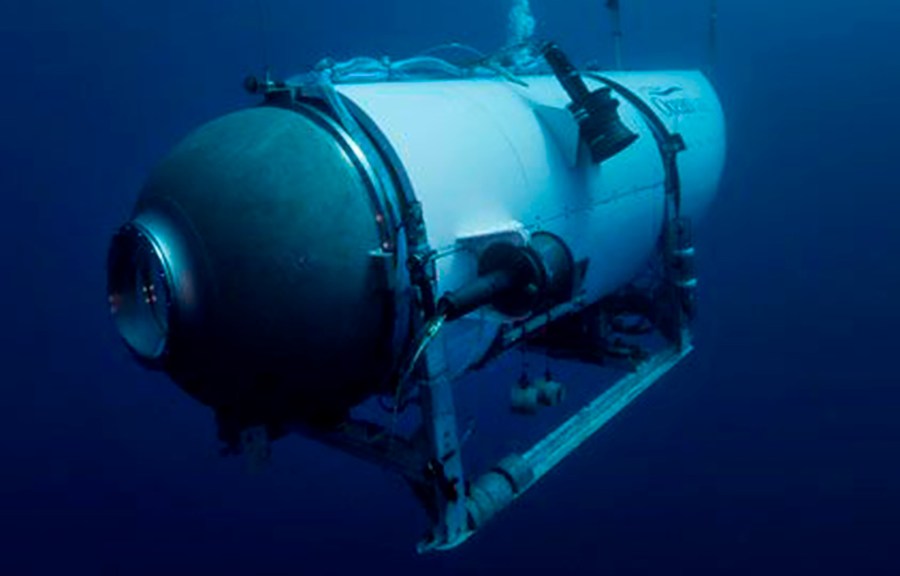 FILE - This undated image provided by OceanGate Expeditions in June 2021 shows the company's Titan submersible. The wrecks of the Titanic and the Titan sit on the ocean floor, separated by 1,600 feet (490 meters) and 111 years of history. How they came together unfolded over an intense week that raised temporary hopes and left lingering questions. (OceanGate Expeditions via AP, File)