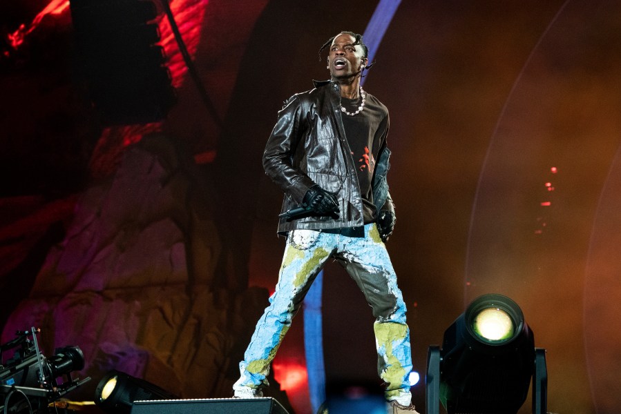 FILE - Travis Scott performs at Day 1 of the Astroworld Music Festival at NRG Park on Friday, Nov. 5, 2021, in Houston. A Texas grand jury has declined to indict Travis Scott in the criminal investigation into a massive crowd surge that killed 10 people at the 2021 Astroworld music festival in Houston, the rappers attorney said Thursday. (Photo by Amy Harris/Invision/AP, File)