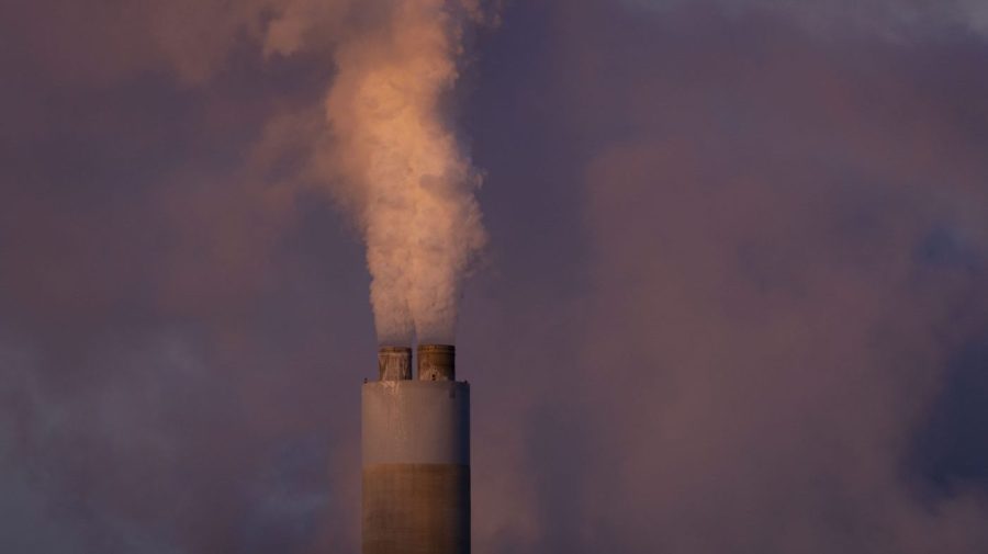 Carbon dioxide and other pollutants billows from a stack at PacifiCorp's coal-fired Naughton Power Plant, Thursday, Jan. 13, 2022, in Kemmerer, Wyo.