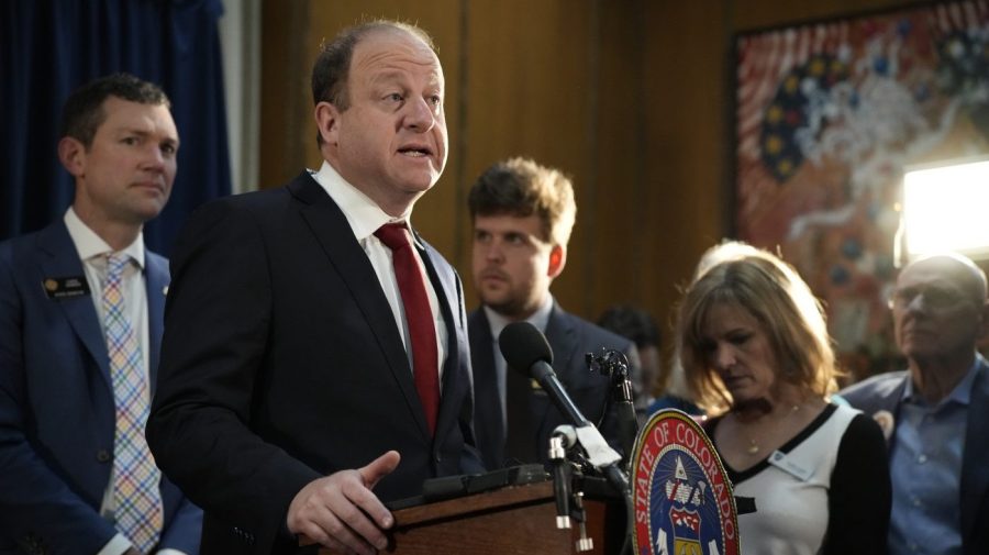 Colorado Gov. Jared Polis speaks at a bill signing event.