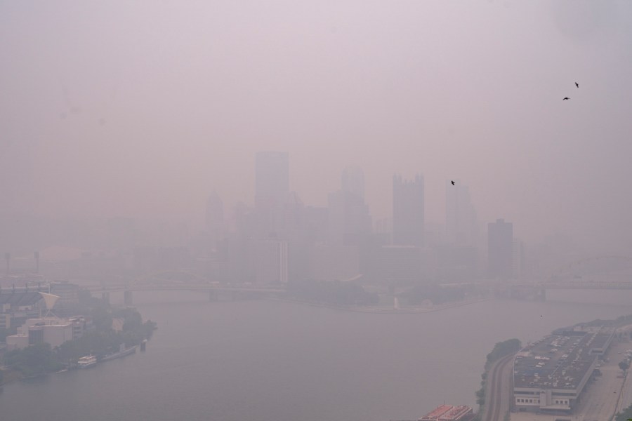 Haze from Canadian wildfires blankets the downtown Pittsburgh skyline as seen from West End Overlook in Elliott, Pa., Wednesday, June 28, 2023.