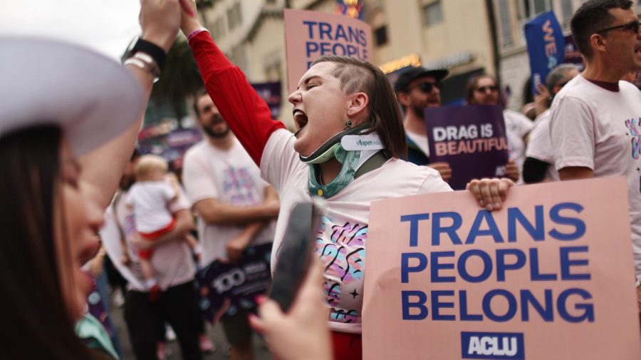 LOS ANGELES, CALIFORNIA - JUNE 11: ACLU march participants chant and hold signs in support of rights for transgender people and drag performers during the 2023 LA Pride Parade in Hollywood on June 11, 2023 in Los Angeles, California. The annual parade draws thousands of revelers to Hollywood Boulevard. According to the American Civil Liberties Union, nearly 500 anti-LGBTQ+ bills have been introduced across the U.S. in state legislatures since the beginning of 2023. (Photo by Mario Tama/Getty Images)