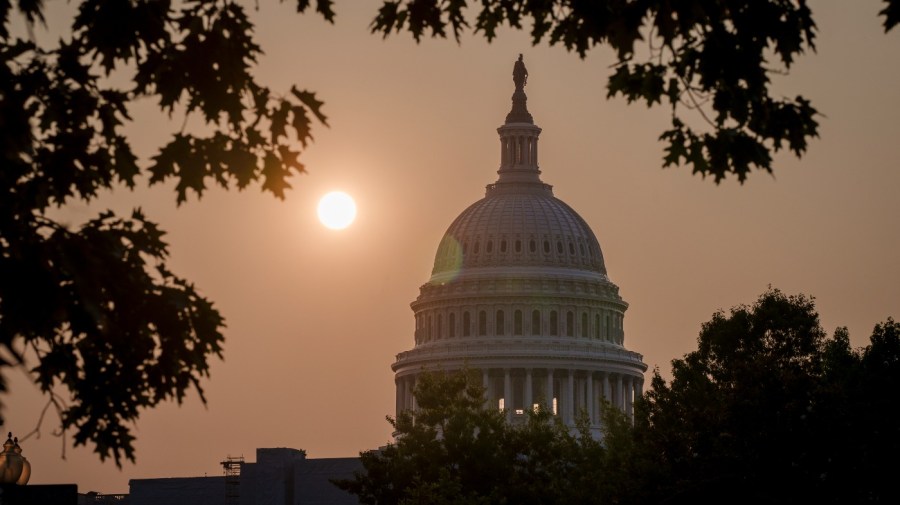 The Capitol is seen at sunrise in Washington, Friday, June 9, 2023. While the air quality remains unhealthy, the record smoke pollution from wildfires in eastern Canada this week has diminished significantly over the nation's capital. (AP Photo/J. Scott Applewhite)