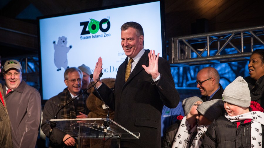 Then-New York Mayor Bill de Blasio (D) speaks at a Groundhogs Day event after viewing Staten Island Chuck, a groundhog who according to tradition looks for his shadow to predict whether or not the region will experience six more weeks of winter or the coming of spring, at the Staten Island Zoo on Feb. 2, 2015.