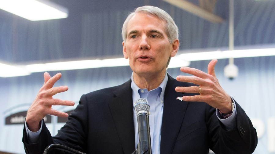 File - In this Feb. 12, 2016, file photo, U.S. Sen. Rob Portman, R-Ohio, speaks during a news conference at a grocery store in Cincinnati.