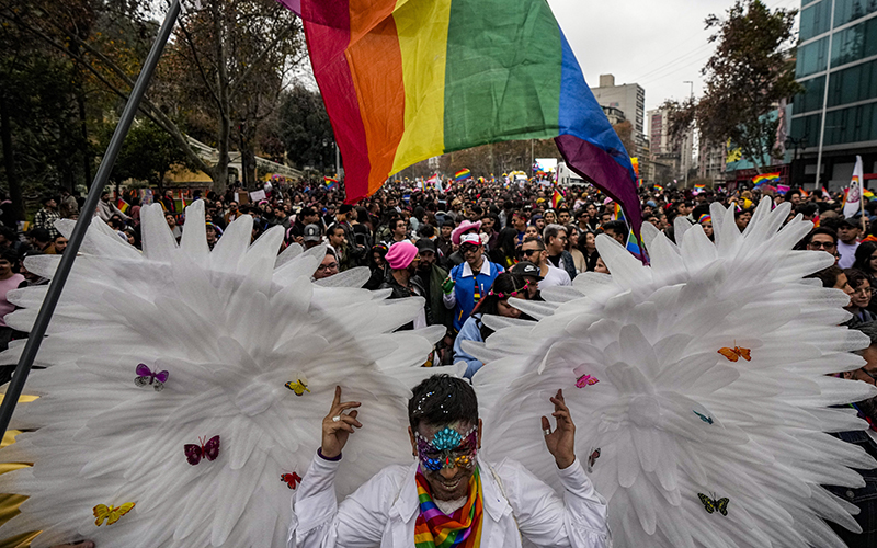 People participate in the annual Pride march in Santiago