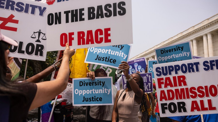 Demonstrators protest for and against the Supreme Court decision to strike down race-conscious student admissions programs at Harvard University and the University of North Carolina at the Supreme Court in Washington, D.C.