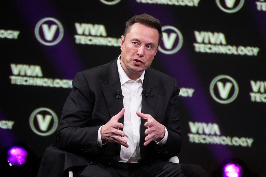 FILE - Elon Musk, who owns Twitter, Tesla and SpaceX, speaks at the Vivatech fair, June 16, 2023, in Paris. Thousands of people logged complaints about problems accessing Twitter on Saturday, July 1, after Musk limited most users to viewing 600 tweets a day — restrictions he described as an attempt to prevent unauthorized scraping of potentially valuable data from the site. (AP Photo/Michel Euler, File)