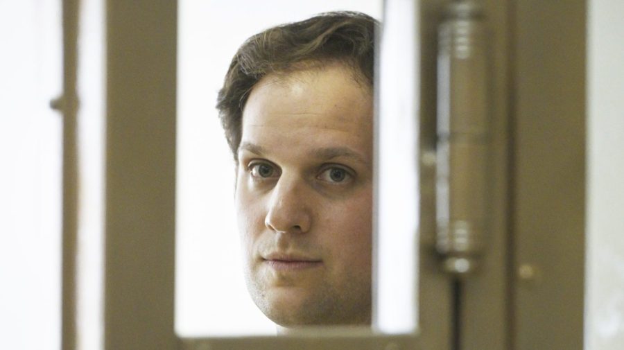 Wall Street Journal reporter Evan Gershkovich stands in a glass cage in a courtroom at the Moscow City Court in Moscow, Russia, Thursday, June 22, 2023. Gershkovich, a reporter detained on espionage charges in Russia, appeared in court Thursday to appeal his extended detention. (AP Photo/Dmitry Serebryakov)