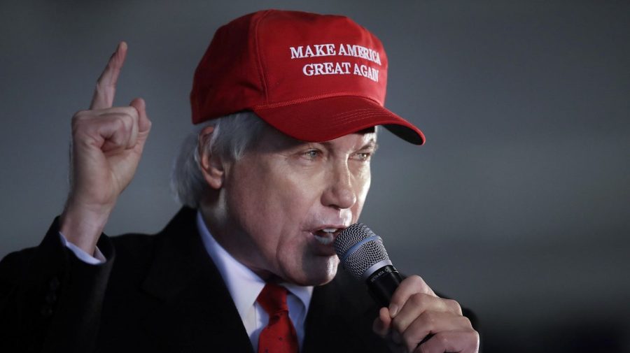 FILE - In this Dec. 2, 2020 file photo, Attorney Lin Wood, member of President Donald Trump's legal team, gestures while speaking during a rally in Alpharetta, Ga. Wood has asked officials in his home state of Georgia to retire his law license, a move that comes as multiple states have sought to discipline the lawyer for his false insistence that former President Donald Trump actually won the 2020 election. Wood made the request Tuesday and posted it to his Telegram account. (AP Photo/Ben Margot, File)