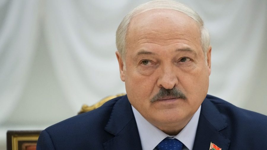 Belarusian President Alexander Lukashenko listens during a meeting.