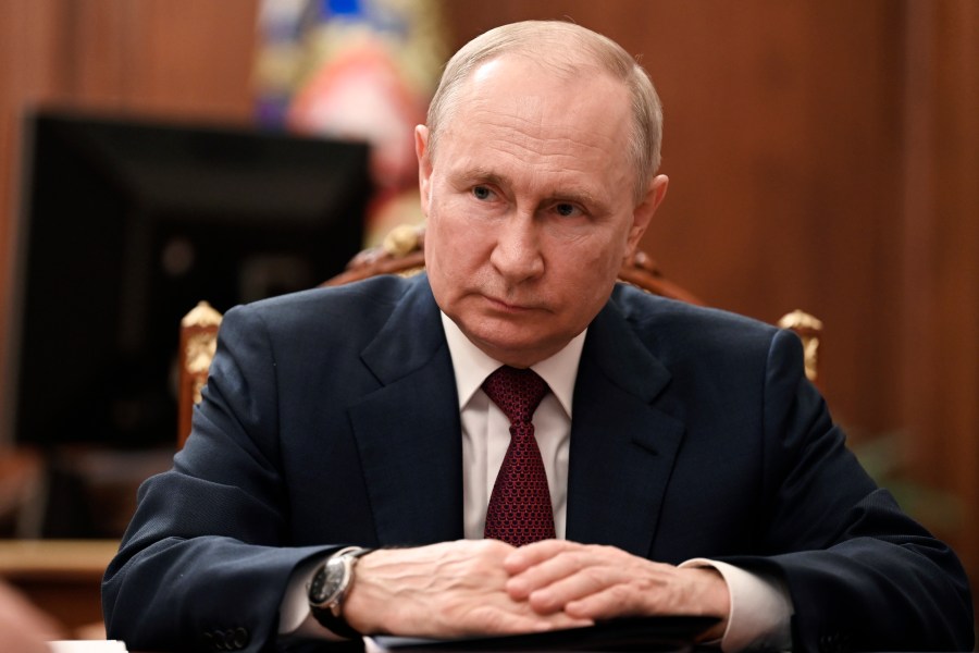 FILE -Russian President Vladimir Putin listens to Russian Prime Minister Mikhail Mishustin during their meeting at the Kremlin in Moscow, Russia, Tuesday, July 4, 2023. Russia’s war in Ukraine will top the agenda when U.S. President Joe Biden and his NATO counterparts hold a summit in the Lithuanian capital Vilnius over two days starting on Tuesday, July 11. (Alexander Kazakov, Sputnik, Kremlin Pool Photo via AP, File)