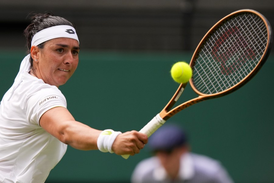 Tunisia's Ons Jabeur returns to Czech Republic's Petra Kvitova in a women's singles match on day eight of the Wimbledon tennis championships in London, Monday, July 10, 2023. (AP Photo/Alberto Pezzali)