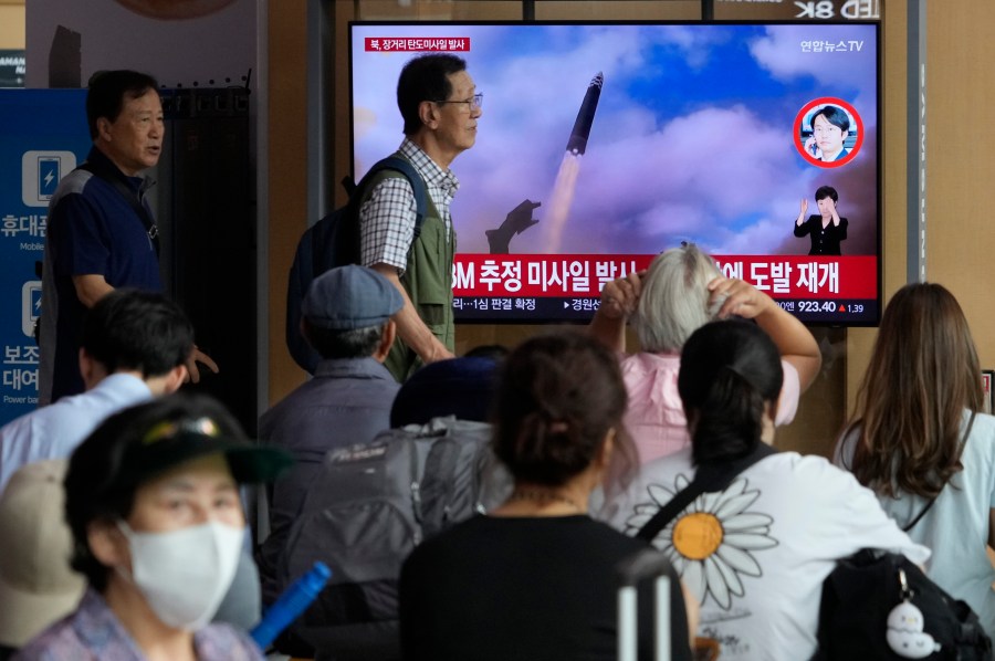 A TV screen shows a file image of North Korea's missile launch during a news program at the Seoul Railway Station in Seoul, South Korea, Wednesday, July 12, 2023. North Korea launched a long-range ballistic missile toward its eastern waters Wednesday, its neighbors said, two days after the North threatened "shocking" consequences to protest what it called a provocative U.S. reconnaissance activity near its territory. (AP Photo/Ahn Young-joon)